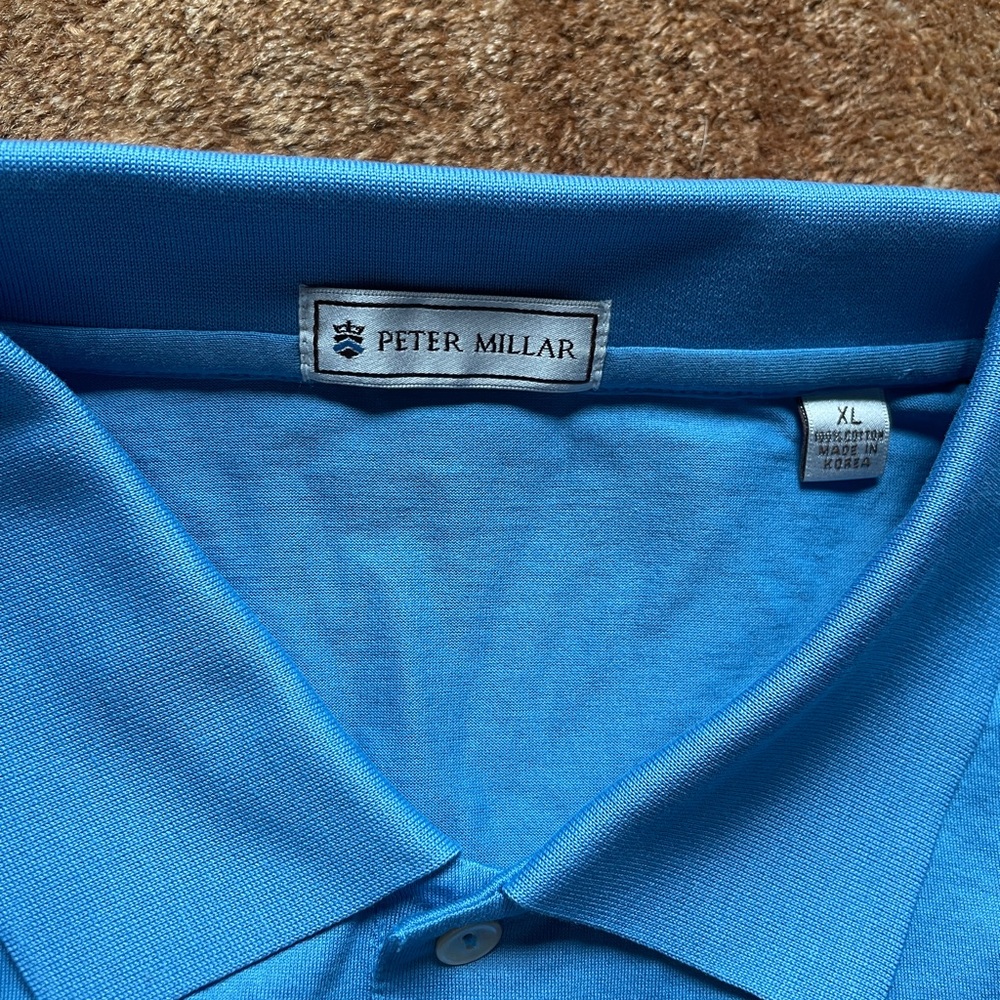 Peter millar XL golf polo “cypress point” logo on left chest.